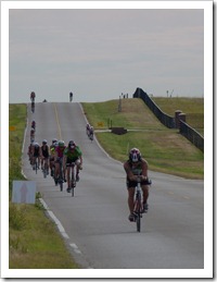 More riders.. you can see some going the other way as they've already made it to the turnaround point.